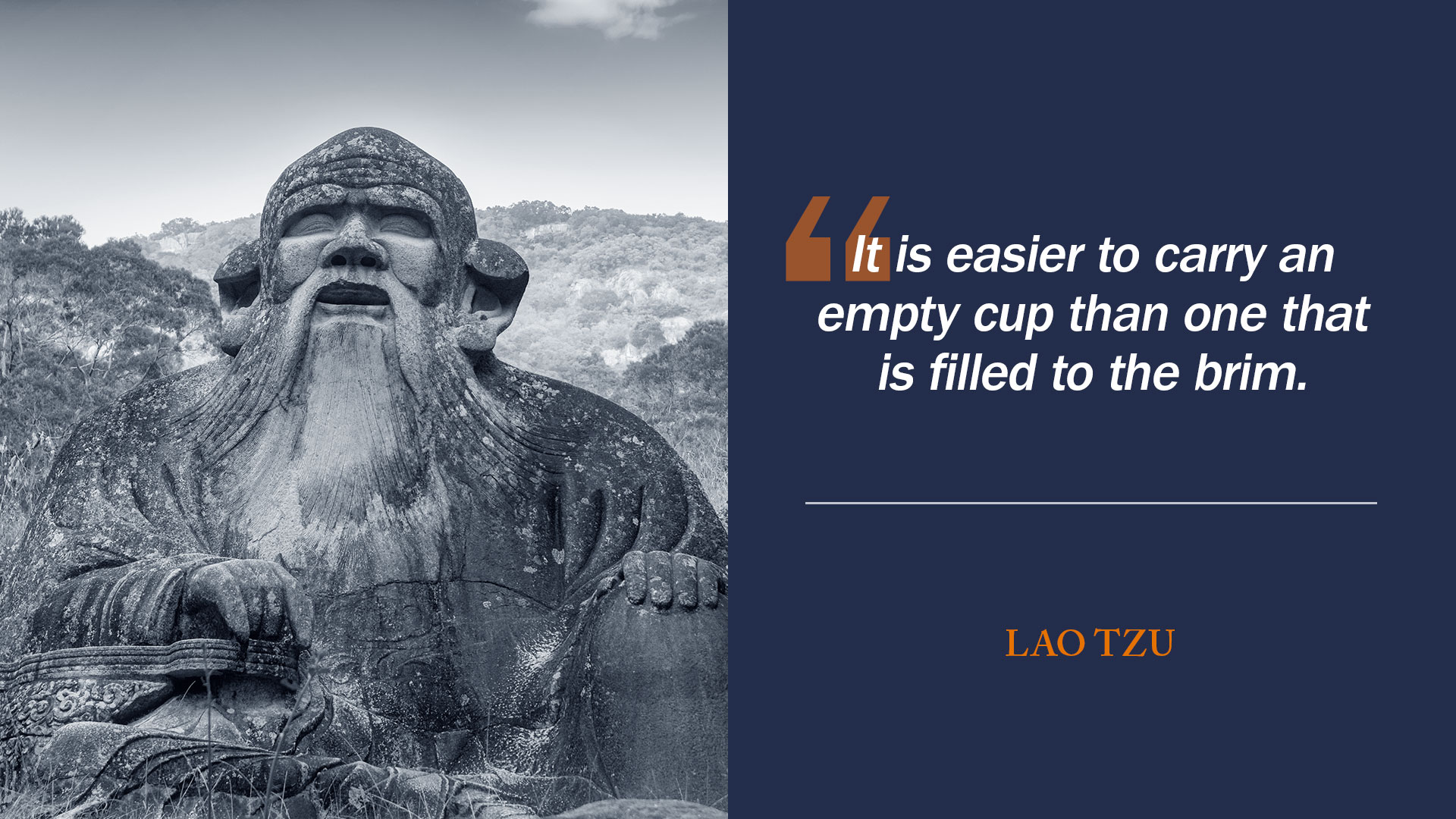 Lao Tzu statue with quote