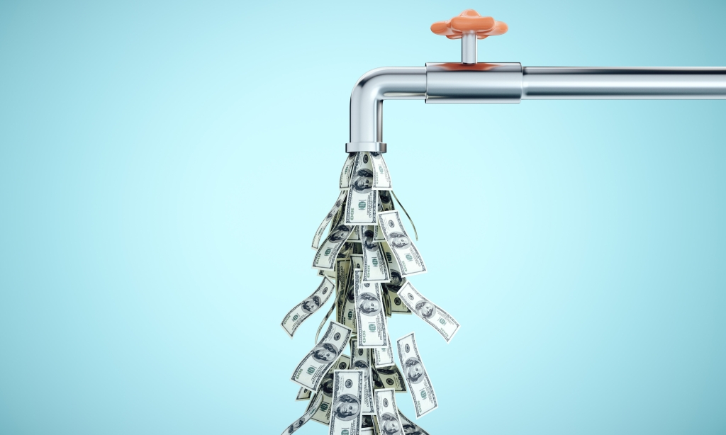 Image of dollar bills falling from a pipe