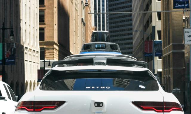 Rear view of an autonomous vehicle on the road